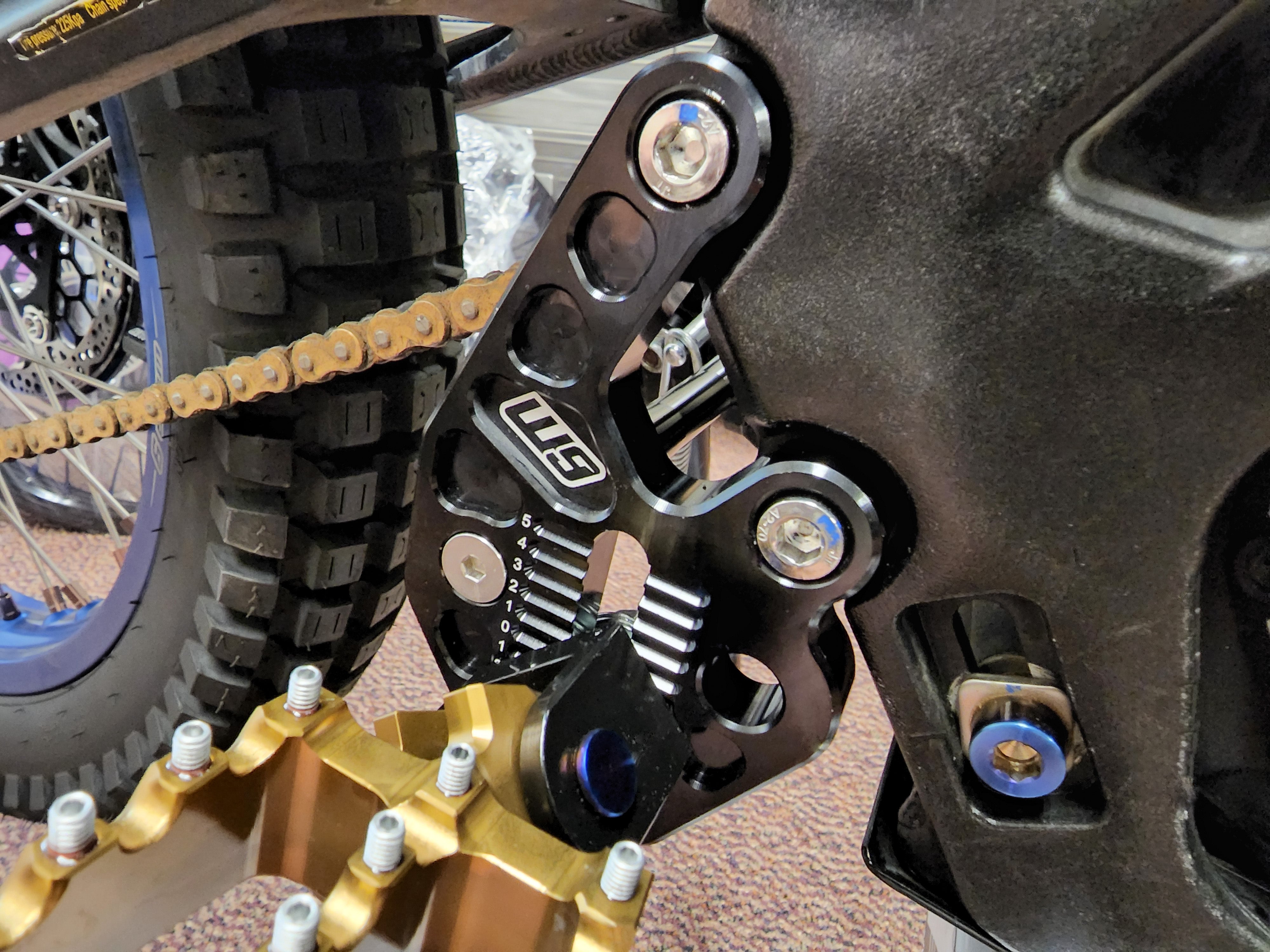 Warp 9 Surron Adjustable Footpeg Mount