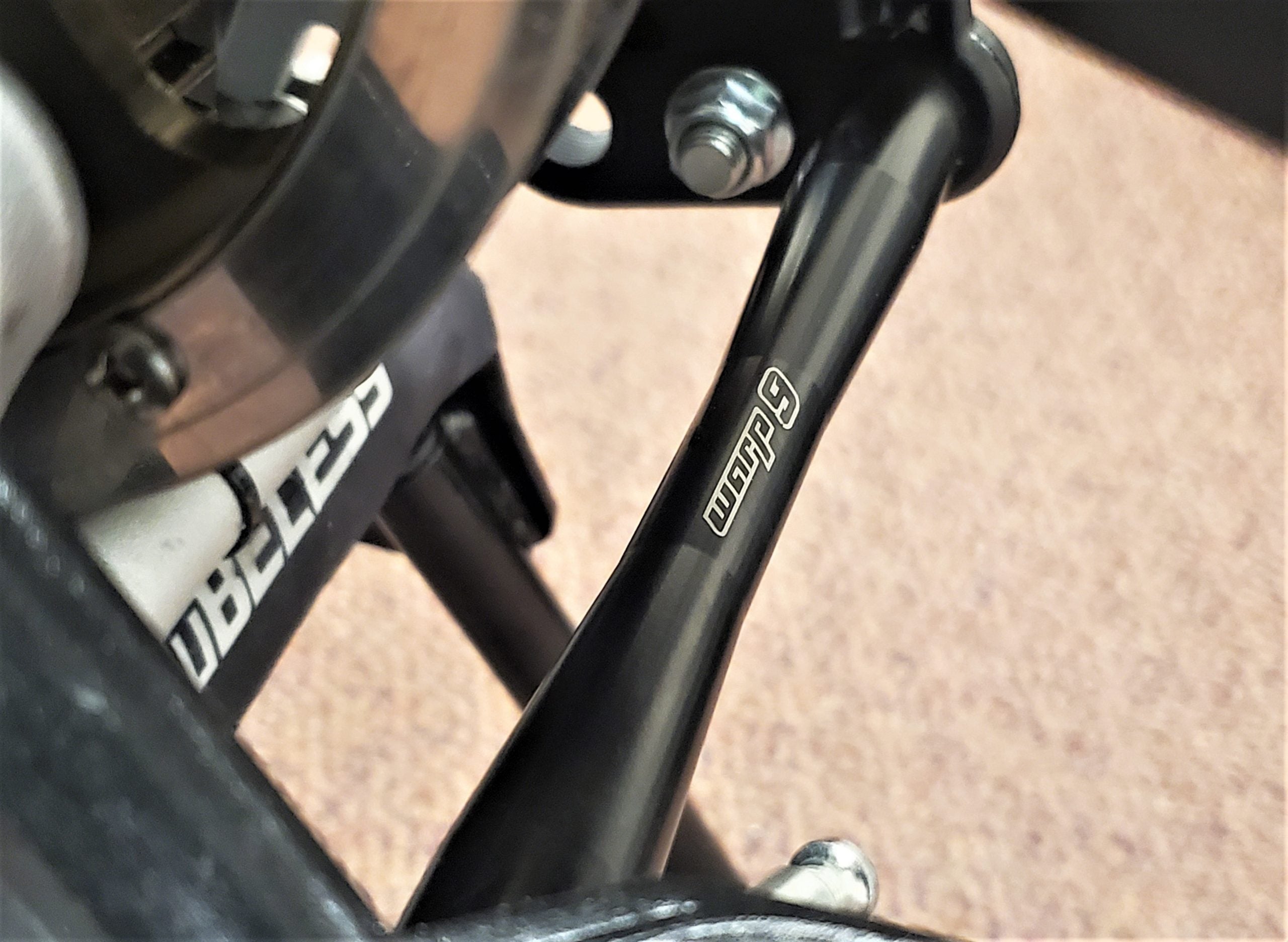 Warp 9 Surron Peg Brace