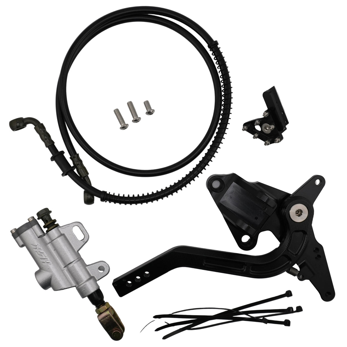 Ultra Bee foot brake kit contents laid out: CNC brake pedal, rear master cylinder, brake line, bolts and zip ties