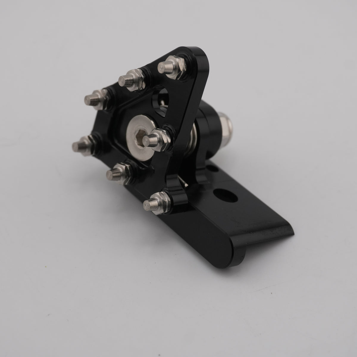 Black CNC foot brake pedal pivot mount for the Sur-Ron Ultra Bee