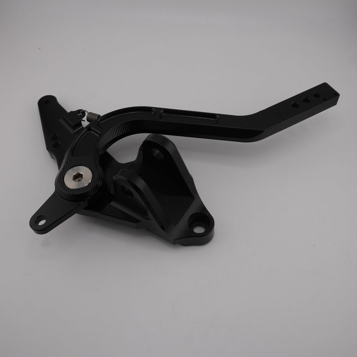 Black CNC foot brake pedal and mounting bracket for Sur-Ron Ultra Bee, side view