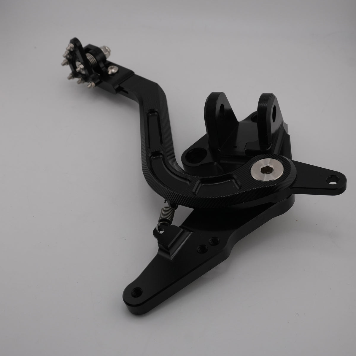 Ultra Bee foot brake pedal with folding tip and CNC mounting bracket, angled view