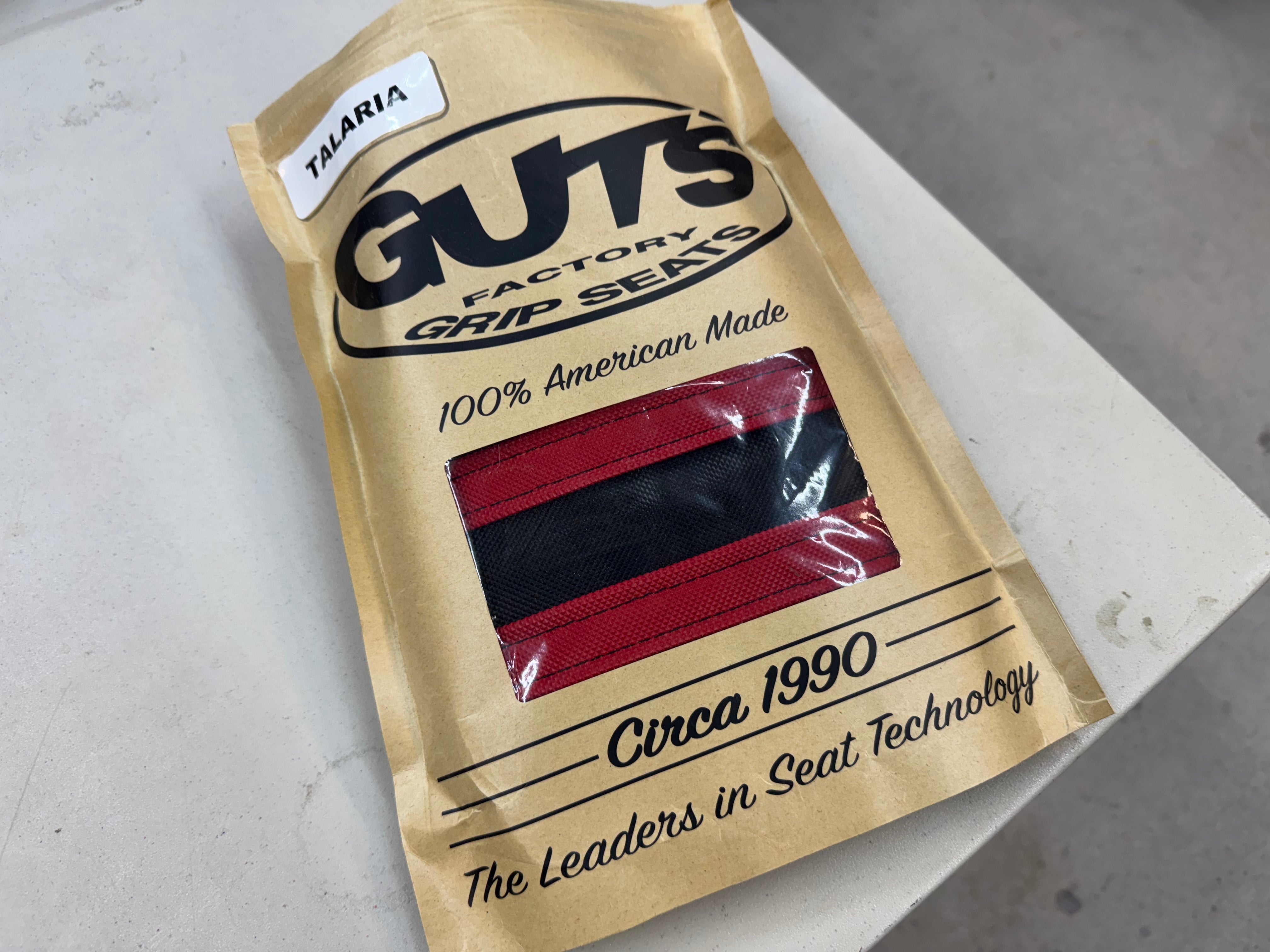 Return, Guts Seat cover Black/ Red Ribs for Talaria sting