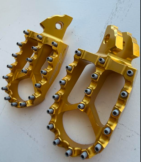 Return, Warp 9 Surron Foot Pegs Gold